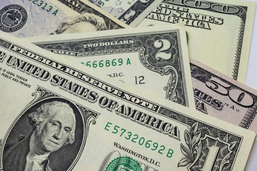 close up US dollar banknotes on background.
