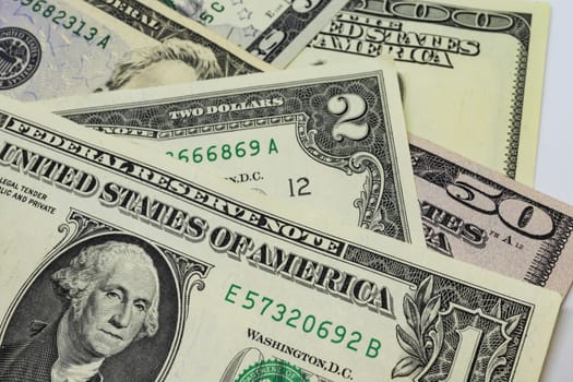 close up US dollar banknotes on background.