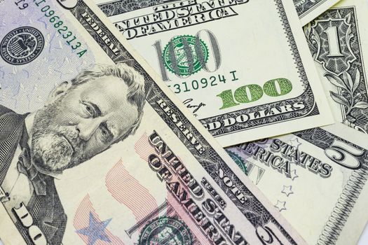close up US dollar banknotes on background.
