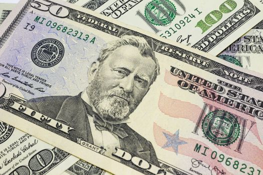 close up US dollar banknotes on background.