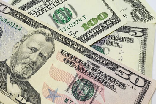close up US dollar banknotes on background.