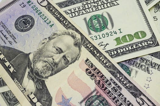 close up US dollar banknotes on background.