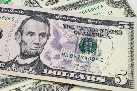 close up US dollar banknotes on background.