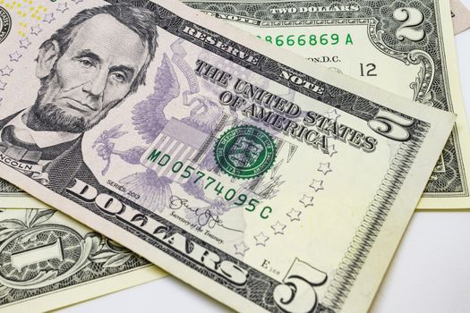 close up US dollar banknotes on background.