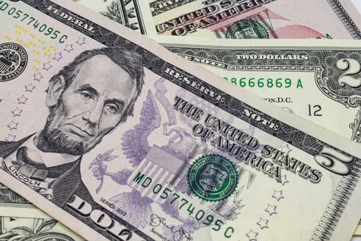 close up US dollar banknotes on background.