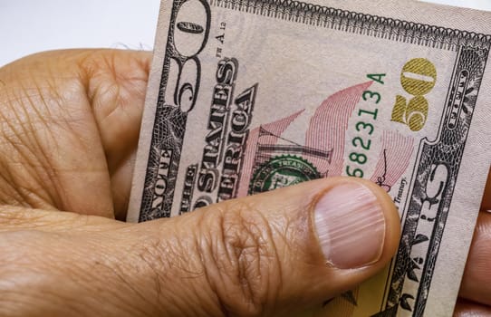 close up US dollar banknotes on background.