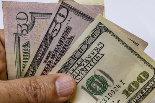 close up US dollar banknotes on background.