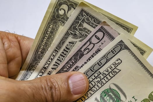 close up US dollar banknotes on background.