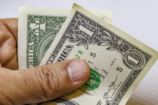 close up US dollar banknotes on background.