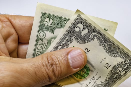 close up US dollar banknotes on background.
