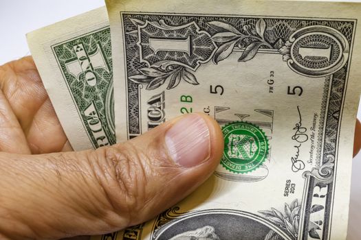 close up US dollar banknotes on background.
