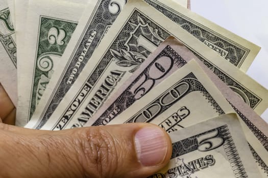 close up US dollar banknotes on background.