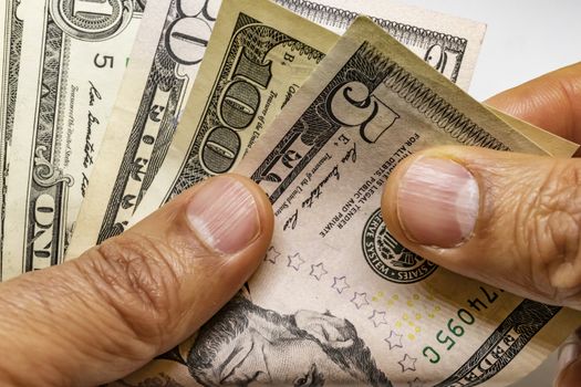 close up US dollar banknotes on background.