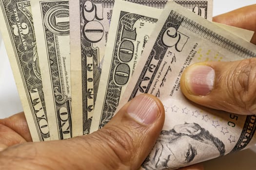 close up US dollar banknotes on background.