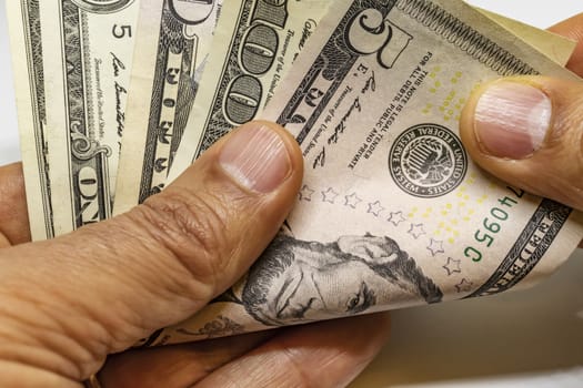 close up US dollar banknotes on background.