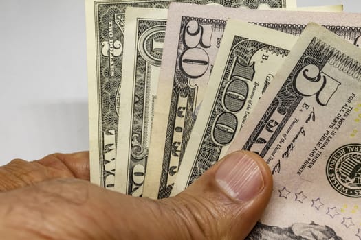 close up US dollar banknotes on background.