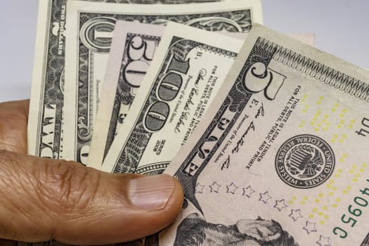 close up US dollar banknotes on background.