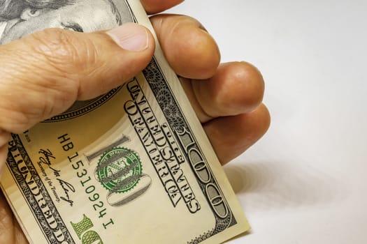 close up US dollar banknotes on background.