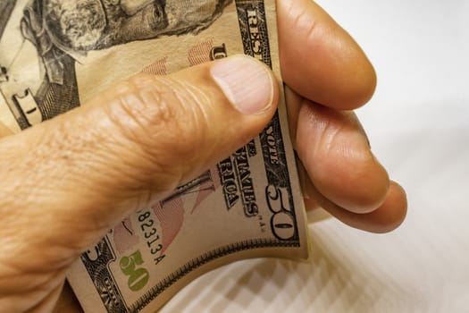 close up US dollar banknotes on background.