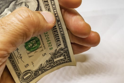 close up US dollar banknotes on background.