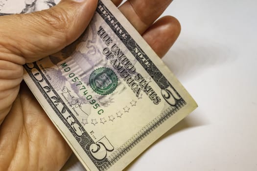 close up US dollar banknotes on background.