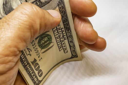 close up US dollar banknotes on background.