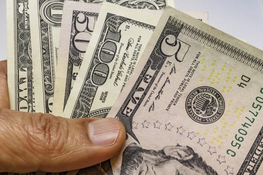 close up US dollar banknotes on background.