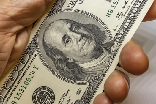 close up US dollar banknotes on background.