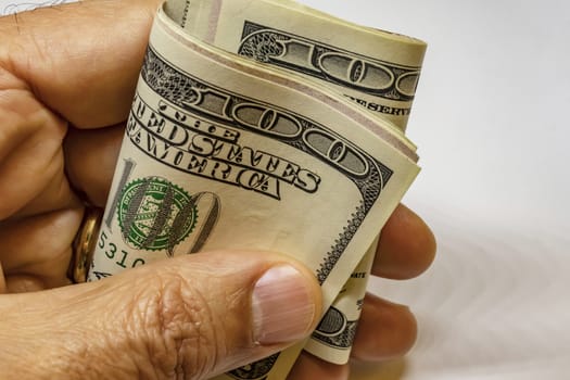 close up US dollar banknotes on background.
