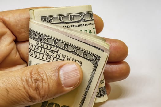 close up US dollar banknotes on background.