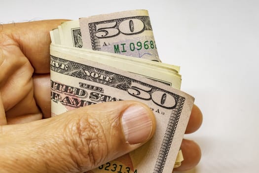 close up US dollar banknotes on background.