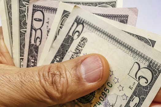 close up US dollar banknotes on background.
