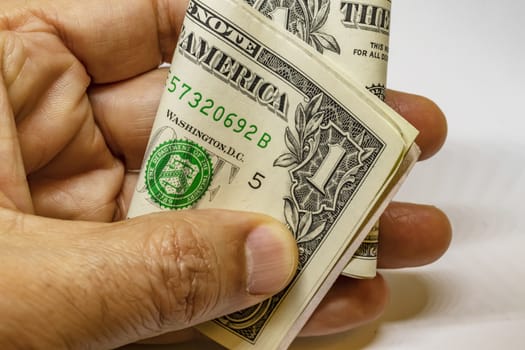 close up US dollar banknotes on background.