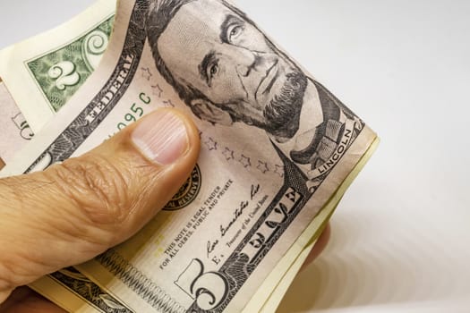 close up US dollar banknotes on background.