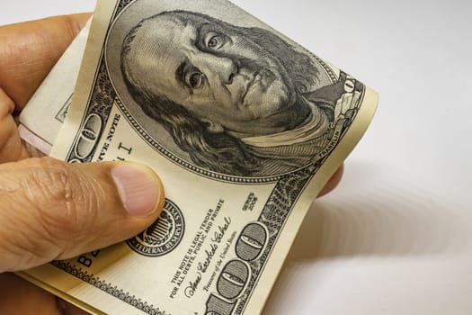 close up US dollar banknotes on background.