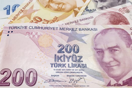 close up turkish lira banknotes on background