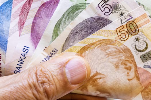 close up turkish lira banknotes on background