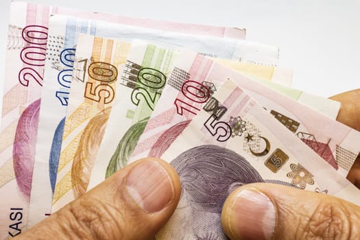 close up turkish lira banknotes on background