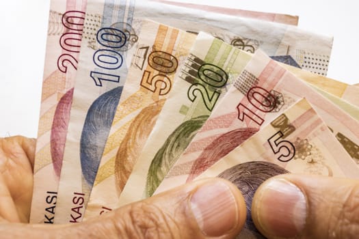 close up turkish lira banknotes on background