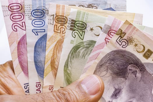 close up turkish lira banknotes on background