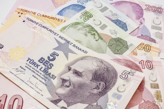 close up turkish lira banknotes on background