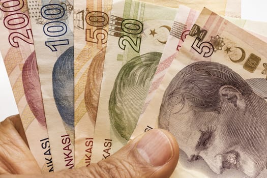 close up turkish lira banknotes on background