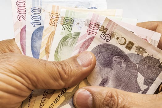 close up turkish lira banknotes on background