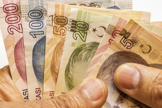 close up turkish lira banknotes on background