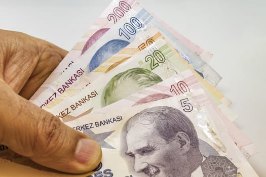 close up turkish lira banknotes on background