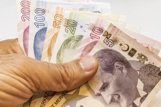 close up turkish lira banknotes on background