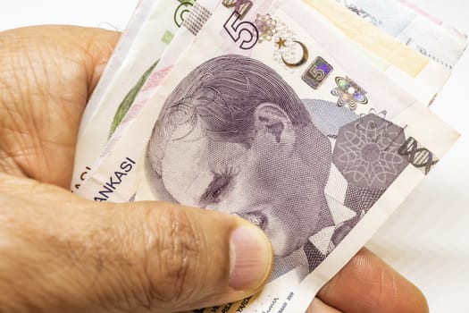 close up turkish lira banknotes on background