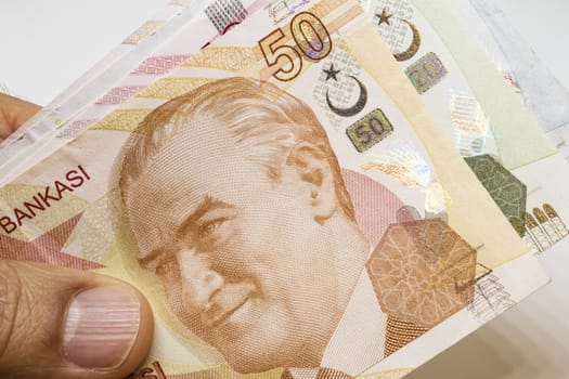 close up turkish lira banknotes on background