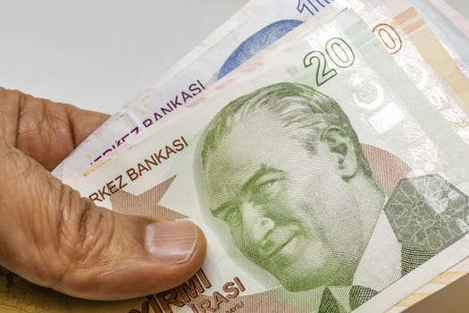 close up turkish lira banknotes on background
