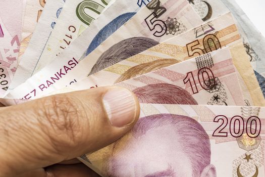 close up turkish lira banknotes on background